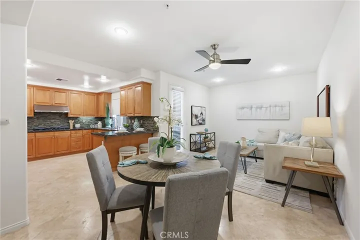 A breakfast nook is located just off the kitchen and in the same space of the family room. Lots of light and direct access to the back patio.