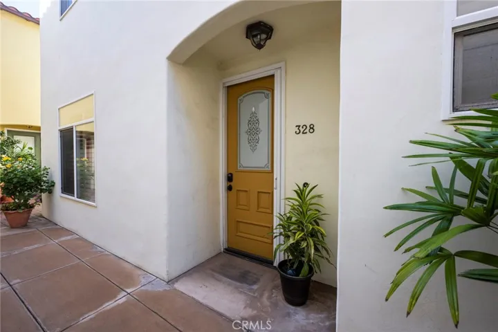 Welcome to 328 5th Street, Huntington Beach. this is an end unit, with no one above or below you.