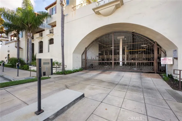 Gated entrance to the parking structure of the complex, with 2 designated parking spaces and extra guest parking, plus a private storage space that comes with the unit.