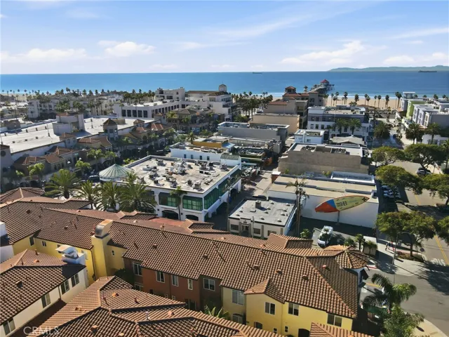 This is a close up view of the rooftops of the complex and the Pacific Ocean 2 blocks away. If you look closely you can also see Catalina Island, the unit is on the lower left side of the photo, the townhome is the white one.