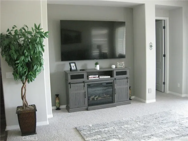 82" TV and Fireplace