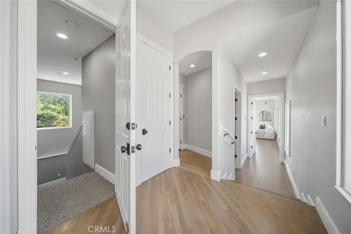 Hall toward laundry, elevator, guest suite