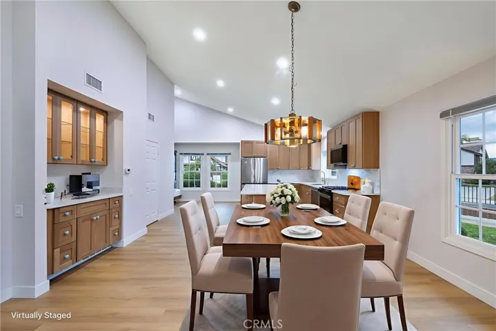 View from the entry over the dining room and toward the kitchen