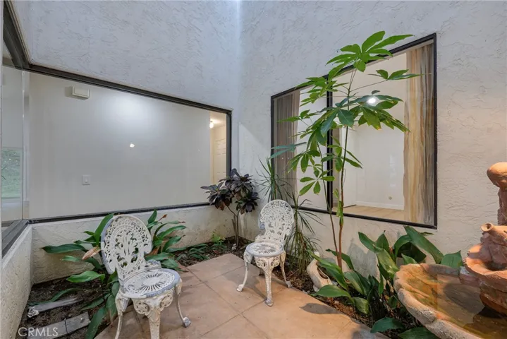 Atrium adjacent to the dining room.  Perfect for a hot tub, or a Zen meditation garden.