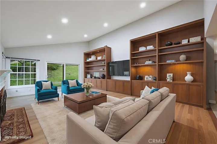 View of the living room toward the sliding doors leading to the back yard.