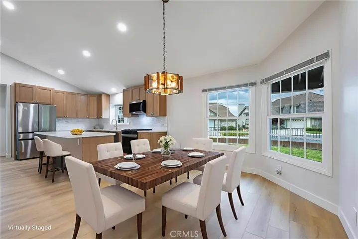 Large dining space adjacent to the wide open kitchen
