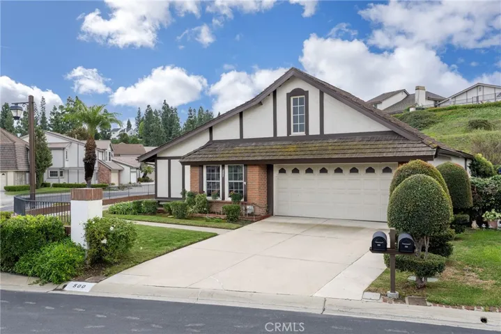 Large Driveway and attached two car garage.