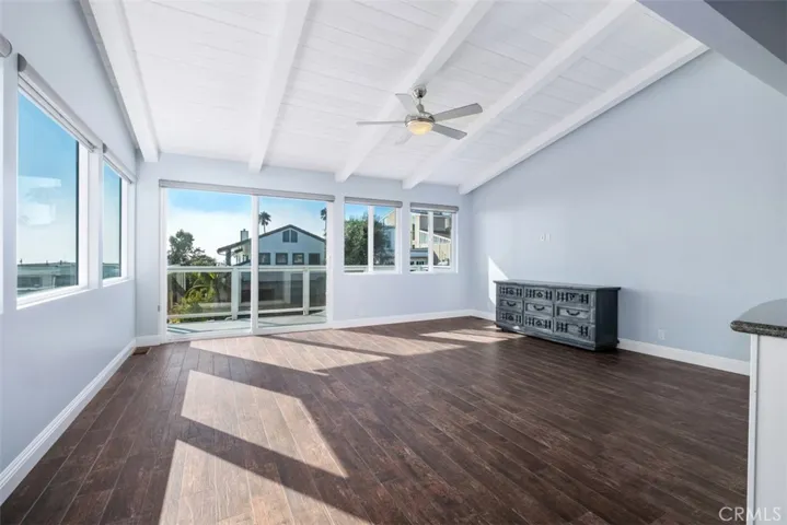 Glass sliding doors leading to large deck area w/ spectacular ocean & Catalina views