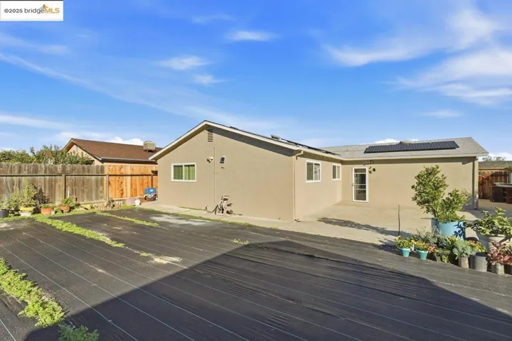 Deck with a fenced backyard