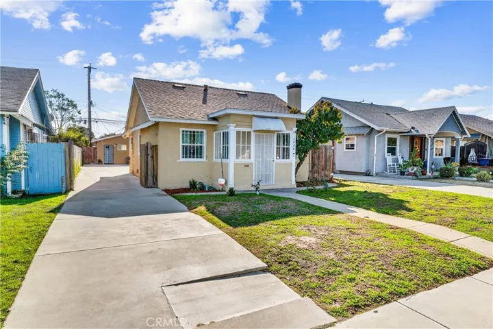 Front of home, showcasing large driveway and ADU in​​‌​​​​‌​​‌‌​​‌​​​‌‌​​​‌​​‌‌​​‌‌​​‌‌​​​​ rear
