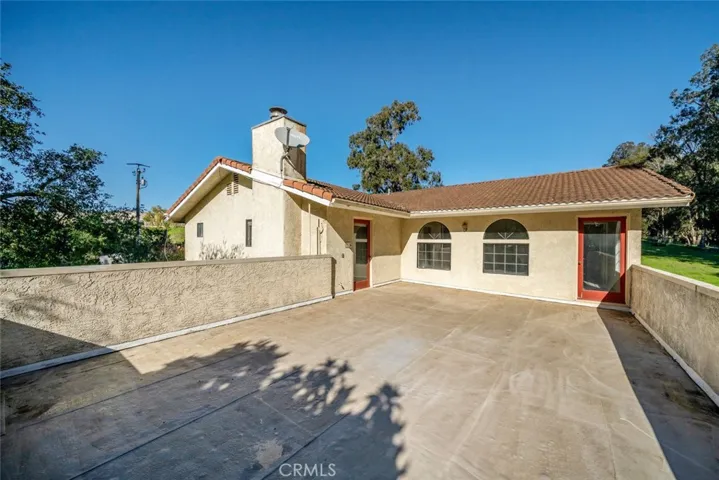 rooftop veranda with access from primary and guest bedroom 1
