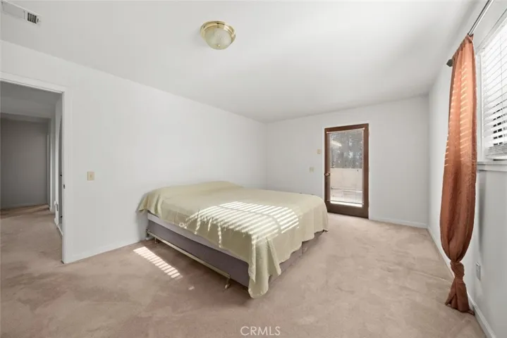 guest bedroom 1 -french door leads to veranda