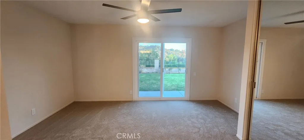 Master bedroom with patio doors