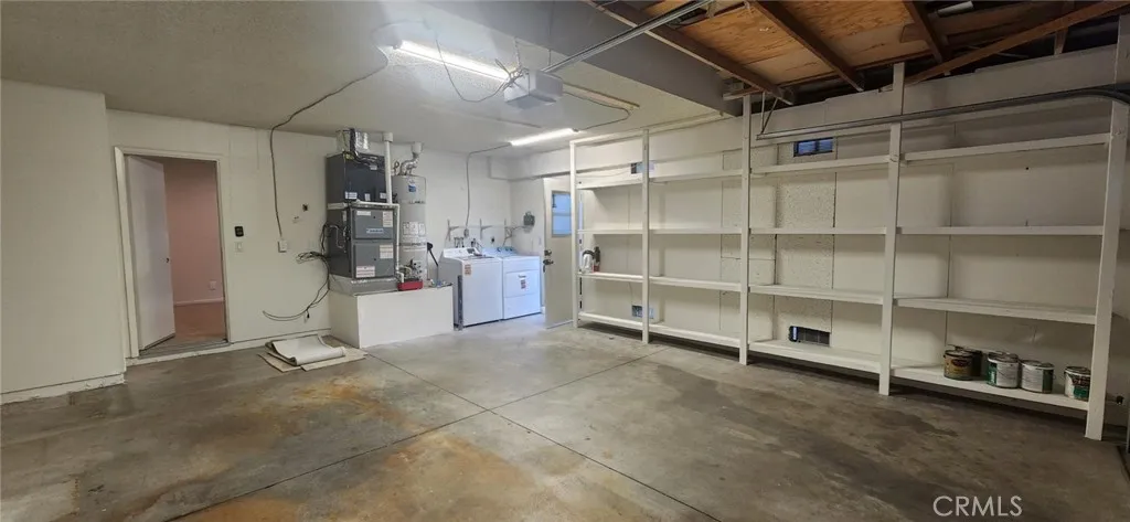 2 car garage with storage shelves and new HVAC