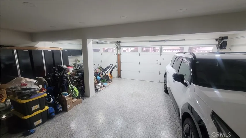 Beautiful Finished 3 Car Garage with Cabinets!