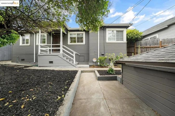Rear view of house with crawl space