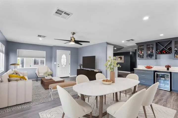 Dedicated laundry room with shelving and convenient layout