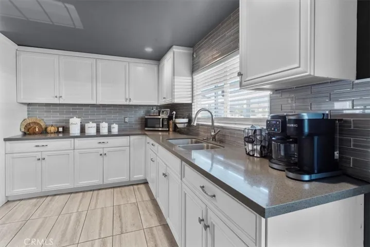 Living and dining combo featuring open floor plan and modern lighting