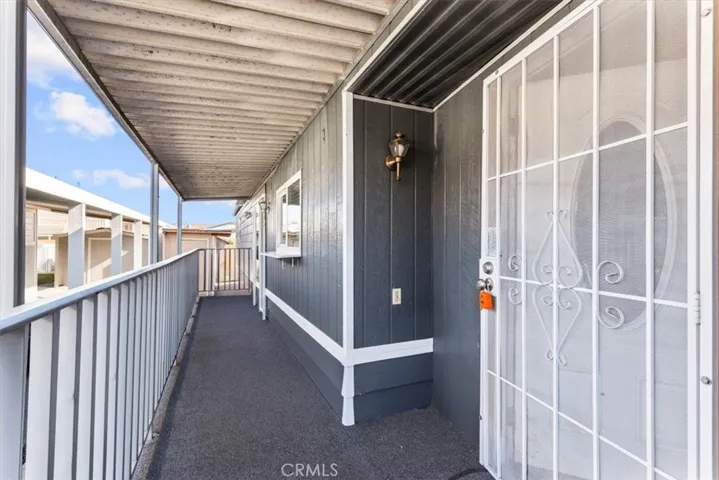 Bright living room featuring ceiling fan, recessed lighting, and open layout