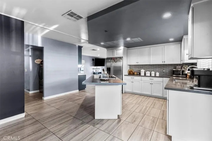 Kitchen view highlighting storage, prep space, and clean finishes