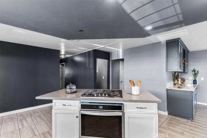 Open kitchen and dining area with bright, inviting atmosphere