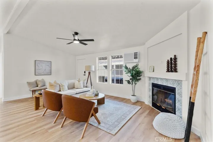 Living room view highlighting modern layout and connection to kitchen area