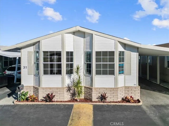 Front exterior view showcasing modern elevation, clean lines, and excellent curb appeal