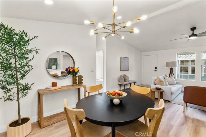 Elegant dining area featuring statement lighting and contemporary design