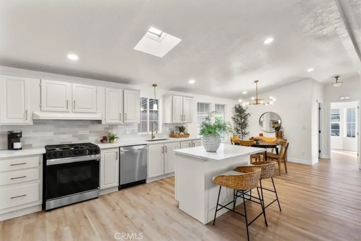 Gourmet kitchen featuring stainless steel appliances and spacious countertops