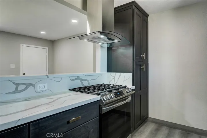 Gas range and oven and plenty of pantry space.
