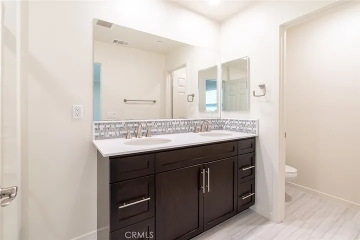 Primary Bdrm - Bathroom