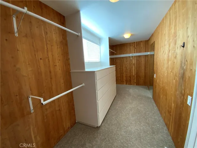 Spacious Cedar Lined Walk-In Closet With Built In's