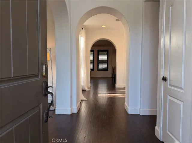 Inviting entrance with your home office to the left, hallway to family room and kitchen straight ahead
