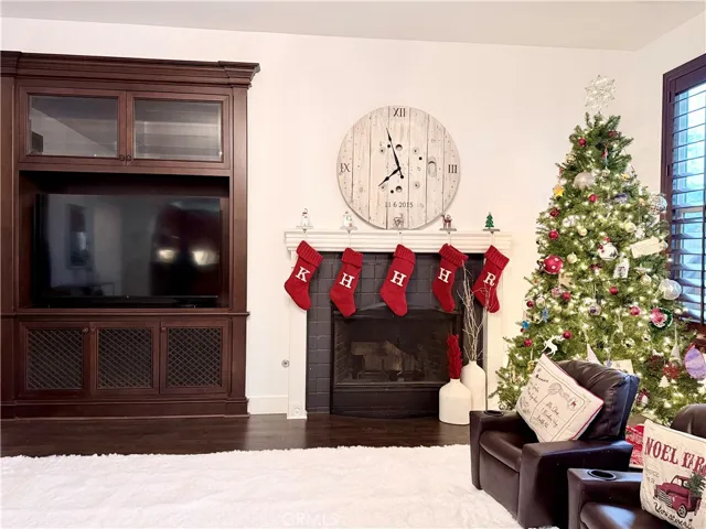 Built in entertainment center and gas-start fireplace in family room