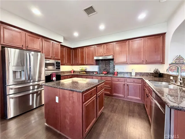 Clever U shaped kitchen design to maximize storage and prep zones