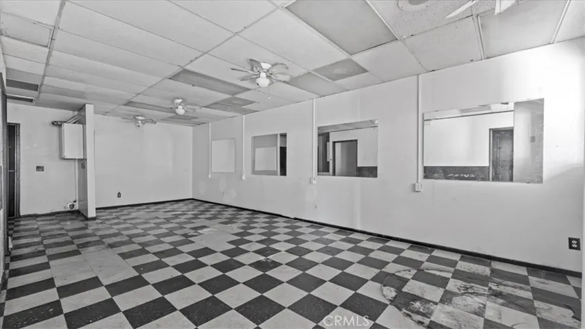 Vacant unit - another angle of break room with checkered tiles