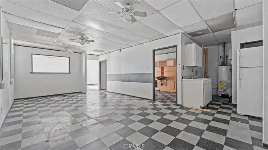 Vacant unit - break room with checkered tiles