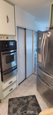 Stainless Steel Oven and Refrigerator included