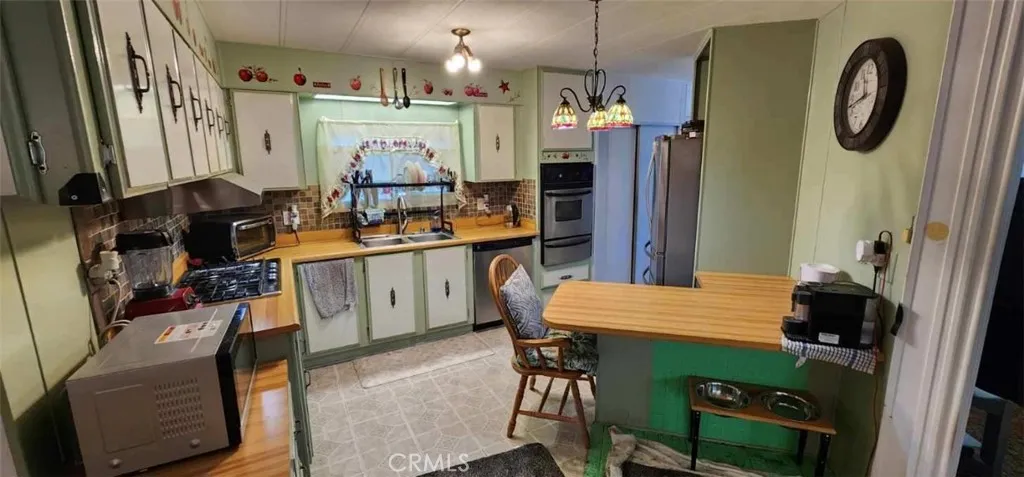 Loads of Storage with generous counter space and easy to clean vinyl flooring.