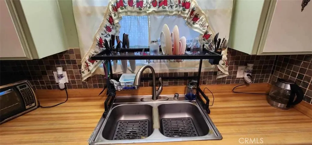 Newer Stainless Steel Double Kitchen Sink. New Garbage Disposal recently Installed