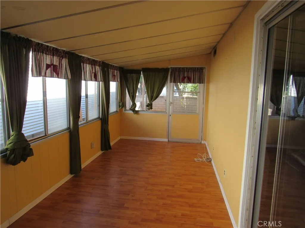 sunroom, craft room or lounging area sunroom, craft room or lounging area
