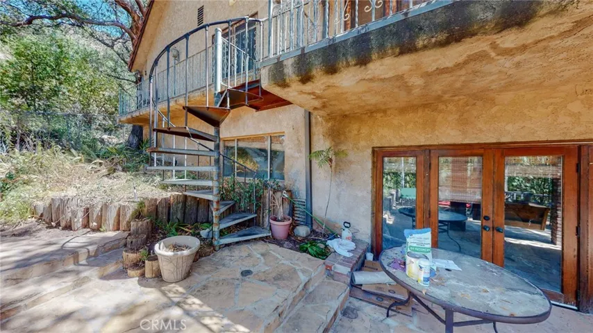 Backyard patio with balconies