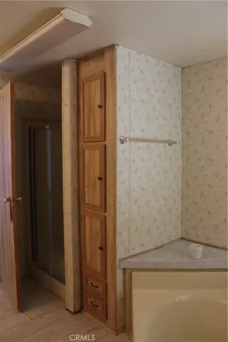 Separate shower in ensuite with additional storage