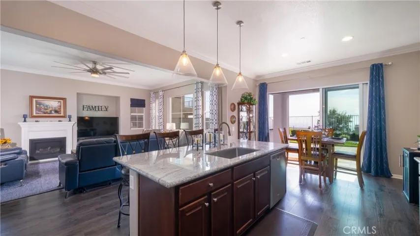 Kitchen With Breakfast Nook Open To Family Room