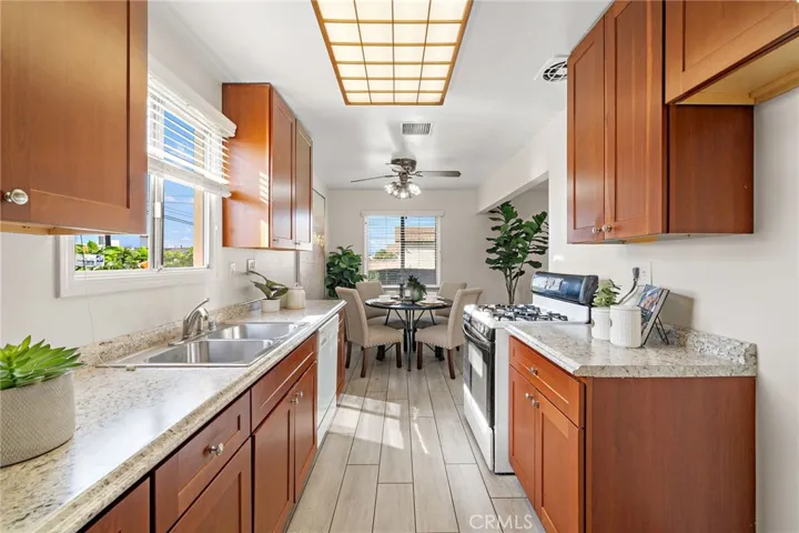 granite-look laminate countertops, rich dark wood cabinetry
