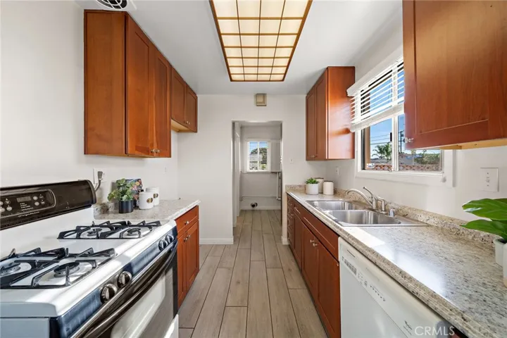 beautiful kitchen showcases wood-grain extra-durable tile flooring