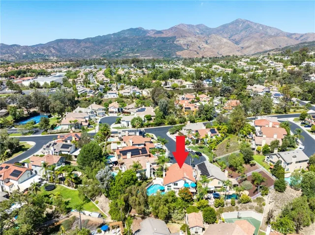 Drone shot capturing the home’s location with scenic mountain and valley views.