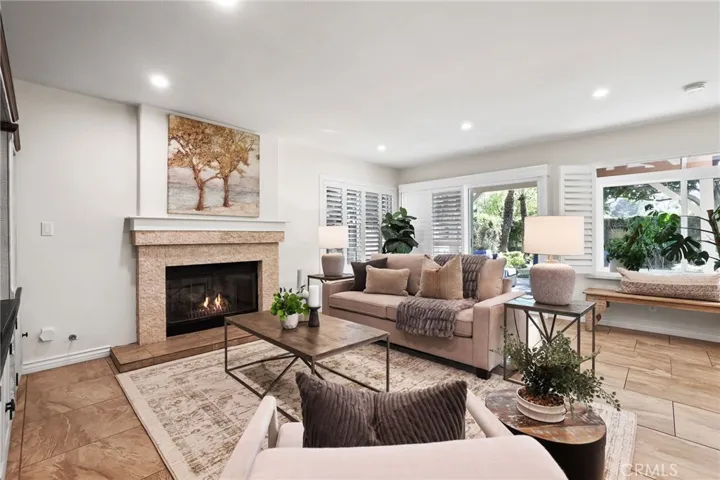 Living area connecting effortlessly to the kitchen and dining spaces for open-concept living.