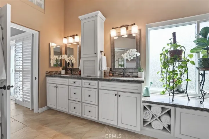 Double sinks, modern fixtures, and ample counter space.