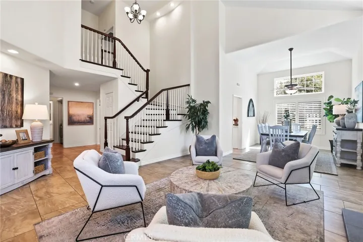 Bright living area with large windows and plenty of natural light.